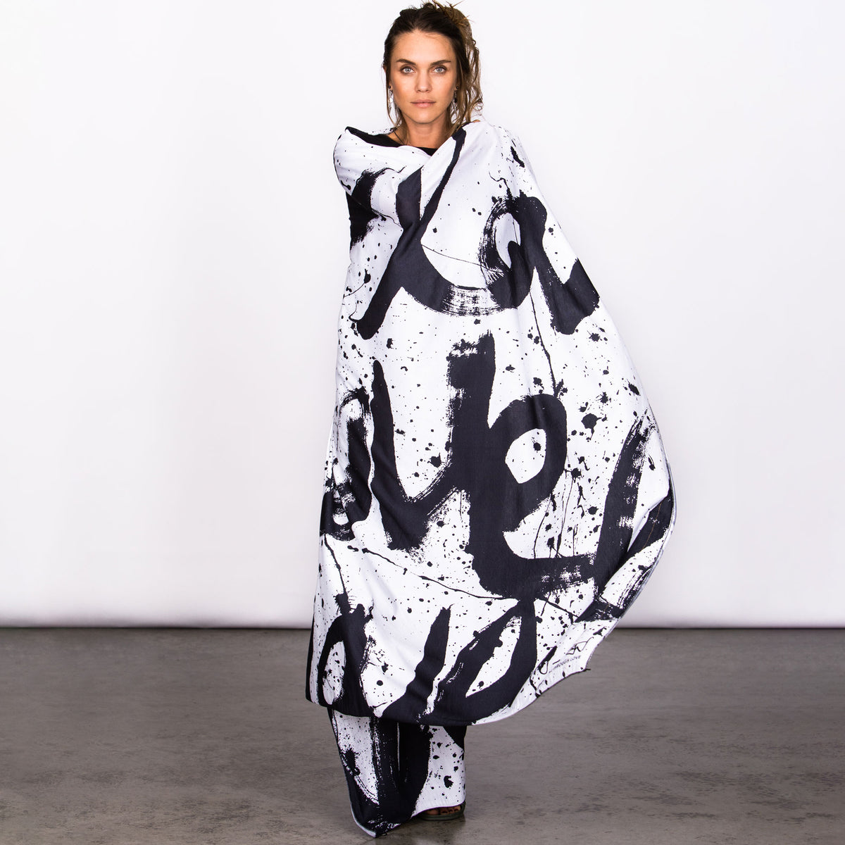 Woman modeling white Ruben LOVE nature wrap