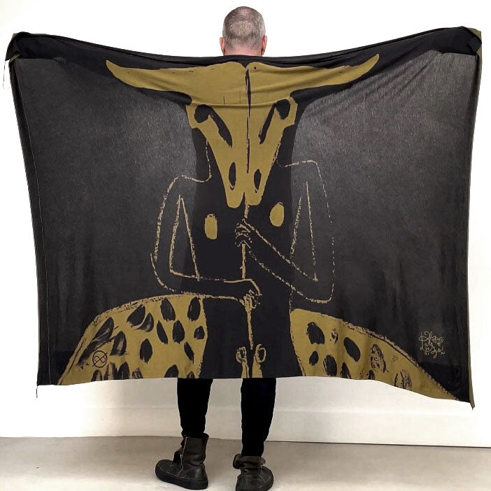 A man wearing the Artist Collab: Carlito Dalceggio x One Golden Thread "Minotaur Nature Wrap"
